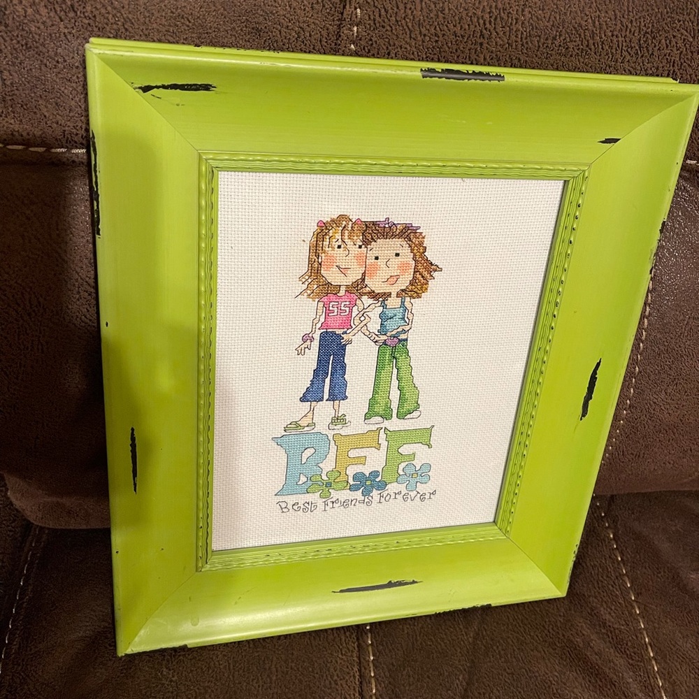 Vintage handmade cross stitch best friends forever in cute like green frame.
